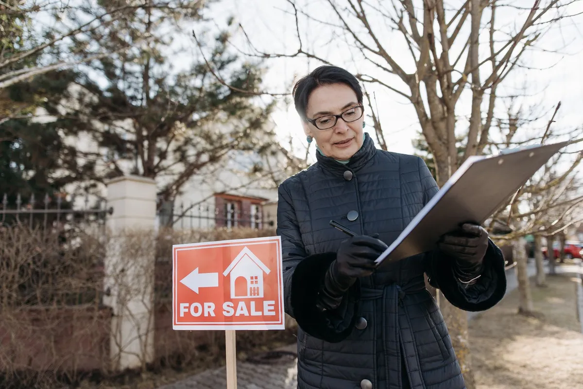A property listing brochure featuring photos and details about a home for sale, highlighting its appeal.
